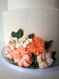 WEDDING CAKE 2 tier classic buttercream wedding cakes, peach coloured floral design elegant simple, 8 and 10 inch round tiers