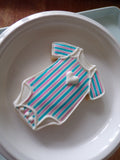 blue and pink striped gender reveal cookies by 23sweets.com with gender reveal colour inside
