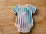 blue and pink striped gender reveal cookies by 23sweets.com with gender reveal colour inside