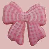 23sweets.com Collection of decorative pink and white cookies shaped like baby-themed items on a white background