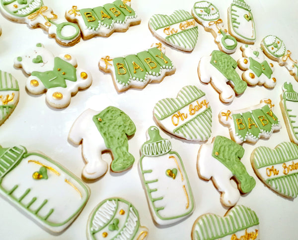 BABY SHOWER COOKIES white, green and gold themed baby shower

COOKIES royal icing DECORATED -COOKIES

baby shower themed cookies with gold detailing

 