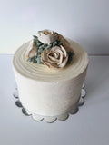 WEDDING CAKE, 8 inch, ridged design with buttercream flower topper