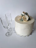 WEDDING CAKE, 8 inch, ridged design with buttercream flower topper