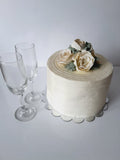 WEDDING CAKE, 8 inch, ridged design with buttercream flower topper