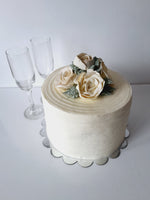 WEDDING CAKE, 8 inch, ridged design with buttercream flower topper