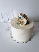 WEDDING CAKE, 8 inch, ridged design with buttercream flower topper