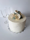 WEDDING CAKE, 8 inch, ridged design with buttercream flower topper