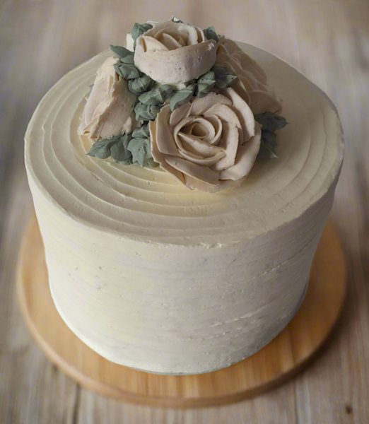 WEDDING CAKE, 8 inch, ridged design with buttercream flower topper