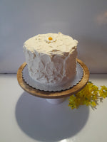 6” Cake with buttercream frosting simply decorated