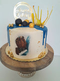 Custom masculine themed 8 inch round cake, fondant motifs cake, with topper
