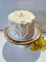 6” Cake with buttercream frosting simply decorated