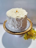 6” Cake with buttercream frosting simply decorated