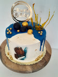 Custom masculine themed 8 inch round cake, fondant motifs cake, with topper