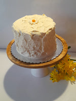 6” Cake with buttercream frosting simply decorated