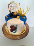Custom masculine themed 8 inch round cake, fondant motifs cake, with topper