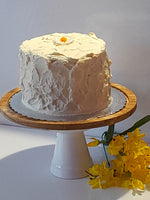 6” Cake with buttercream frosting simply decorated