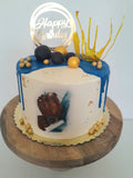 Custom masculine themed 8 inch round cake, fondant motifs cake, with topper