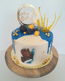 Custom masculine themed 8 inch round cake, fondant motifs cake, with topper