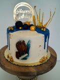 Custom masculine themed 8 inch round cake, fondant motifs cake, with topper