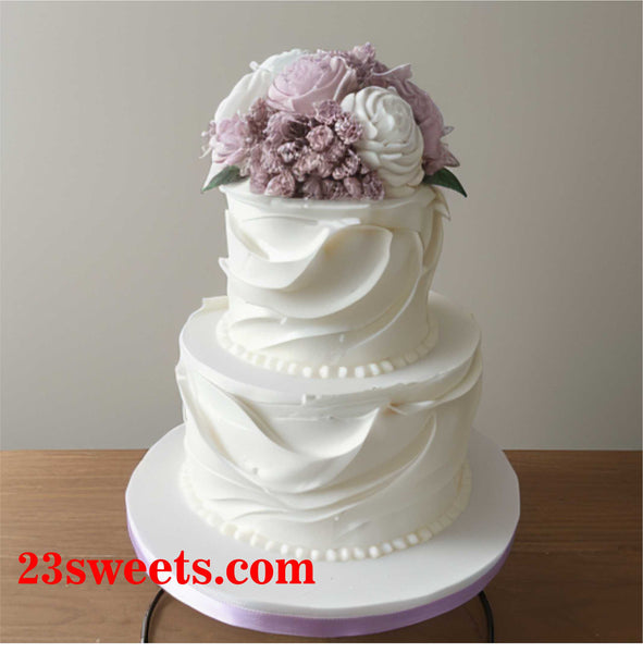Wedding Cake, waves with mauve flowers, wedding cakes, 2 tier  buttercream covered wedding cake with faux roses, 6 and 8 and 10" inch round tiers