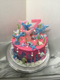 Mermaid themed, 8 inch round with fondant details, and drip