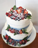 WEDDING CAKE, 2 tier cake with custard filling and topped with fresh fruit.