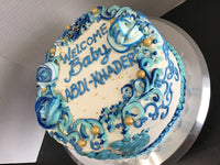 CAKE Blue floral footprint baby themed 8 inch round, buttercream