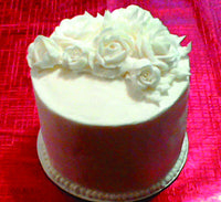 CUSTOM CAKE With buttercream rosettes, lemon flavour